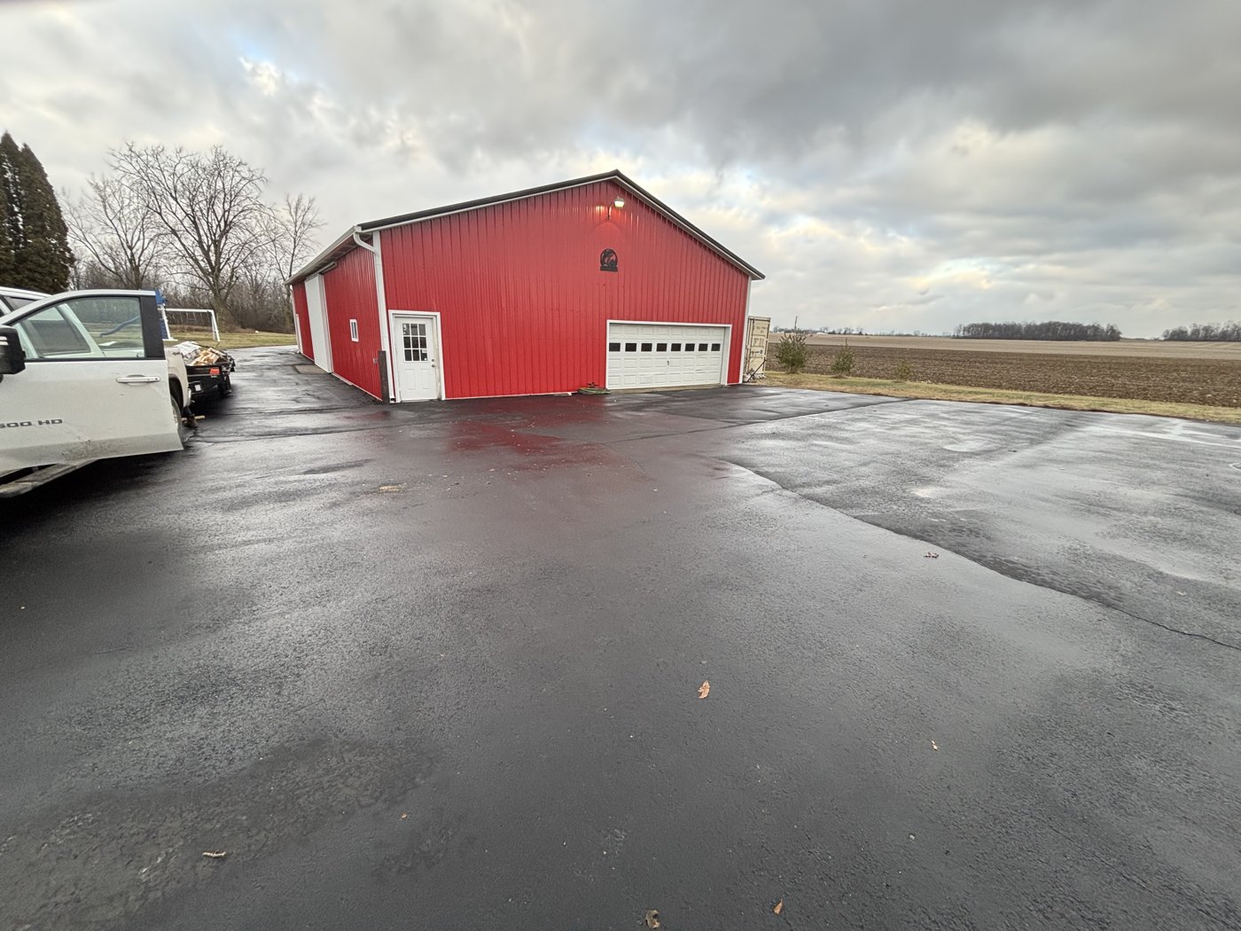 Red Windy Hill pole barn with metal roof and siding